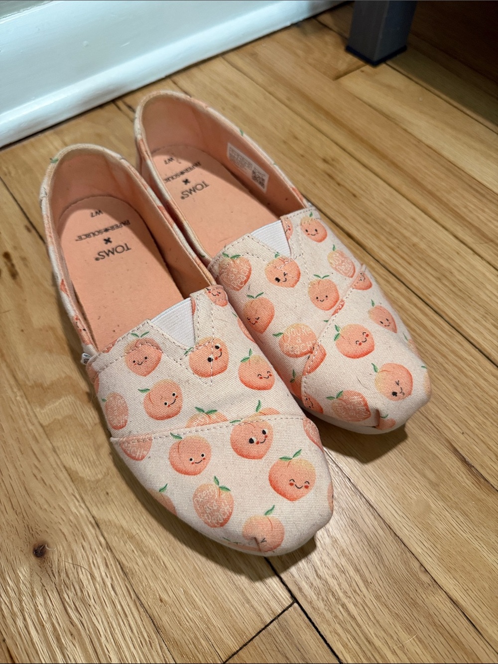 TOMS Woman’s Peach Print Canvas Slip-On Sneakers in Peach and Cream